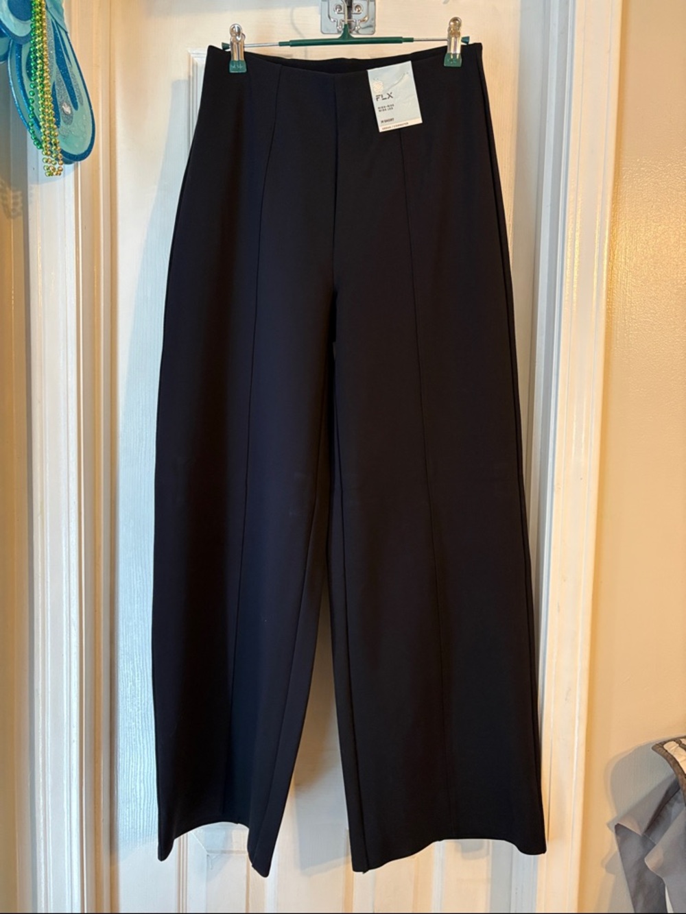 NWT FLX women’s black commuter pants. Medium petite.